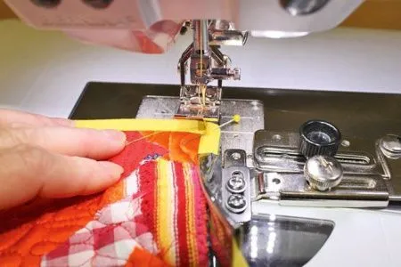 Лапка для окантовки фальцованной косой бейкой Bernina # 87 (20/9.5 мм)