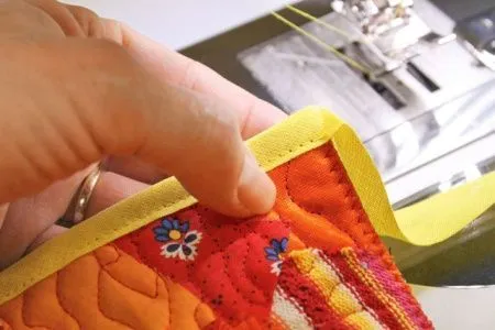 Лапка для окантовки фальцованной косой бейкой Bernina # 87 (20/9.5 мм)